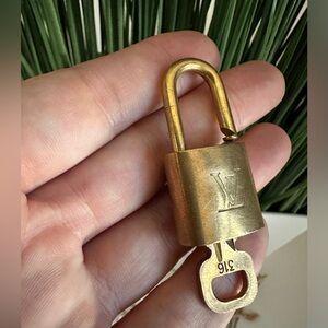 Authentic Louis Vuitton lock with key 316